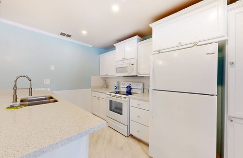 Port Isabel Condo | Waterfront condo with an outdoor pool, washer/dryer, & central AC