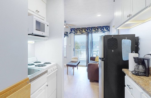 North Shore Condo | Waterfront condo with lake-view deck, tennis court & pool - dog-friendly