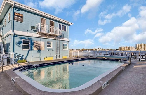 Clearwater Beach Apartment | Waterfront Corner Suite, Heated Pool, Near Beach!
