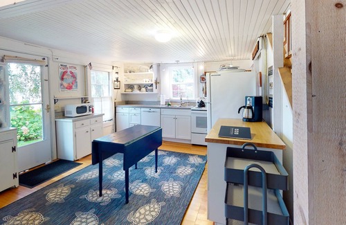 Spruce Head Cottage | Waterfront cottage on Spruce Head Island with dock, beach access, and large yard