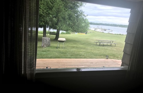 Washington Island Cottage | Waterfront cottage on Detroit Harbor. Beautiful beach and dockage.