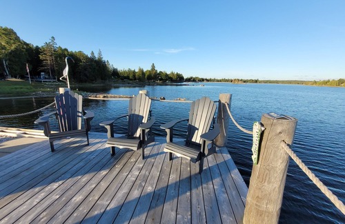 Miller Lake Cottage | Waterfront Cottage w/Sauna and Private Sandy Beach
