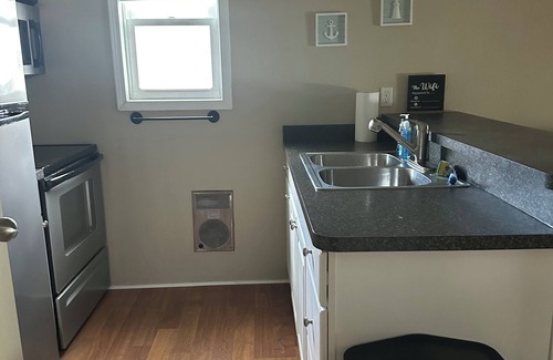 Oak Harbor Condo | Waterfront Cozy 1 Bedroom Condo on the inlet to Lake Erie boat dock steps away.