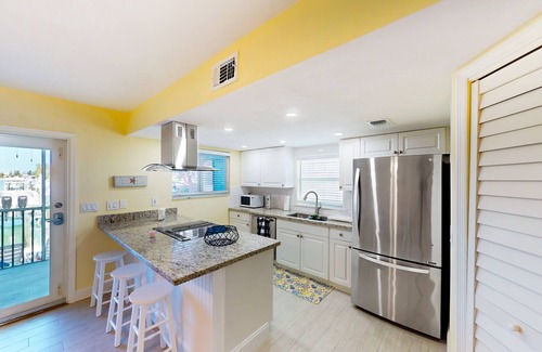 Key Colony Beach House | Waterfront duplex with canal access & Cabana Club pool membership