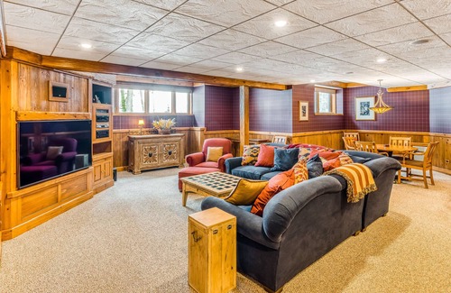 Three Lakes House | Waterfront elegance with private beach & hot tub - dogs welcome
