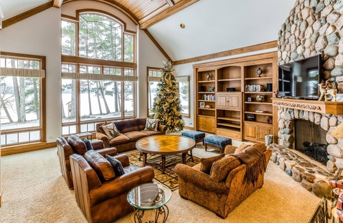Three Lakes House | Waterfront elegance with private beach & hot tub - dogs welcome
