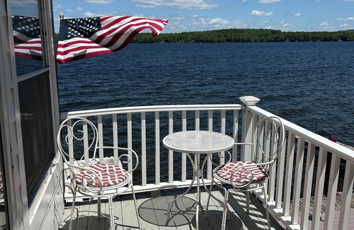 Laconia House | WATERFRONT HOME BOAT HOUSE BOAT SLIPS PANORAMIC LAKE AND GUNSTOCK MOUNTAIN VIEW