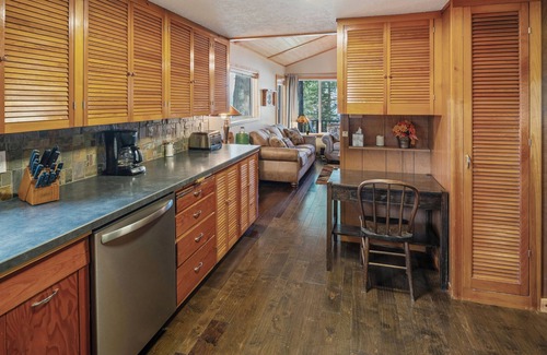 Sandpoint House | Waterfront home in Sagle with a dock, hot tub, and large lawn for families