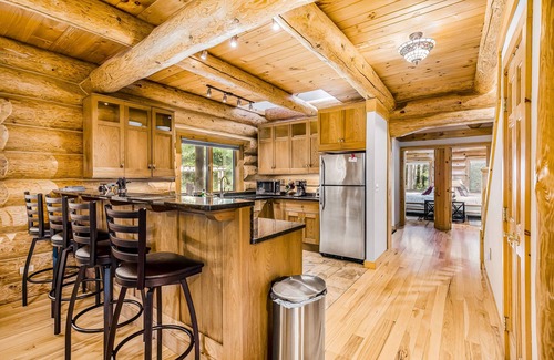 Thompsonville House | Waterfront home on Betsie River with hot tub & sauna near skiing at Crystal Mtn