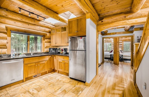 Thompsonville House | Waterfront home on Betsie River with hot tub & sauna near skiing at Crystal Mtn