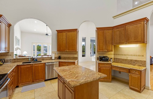 Fort Pierce Shores House | Waterfront home/steps to the beach/private dock/heated pool/spa