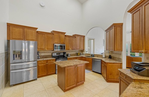Fort Pierce Shores House | Waterfront home/steps to the beach/private dock/heated pool/spa