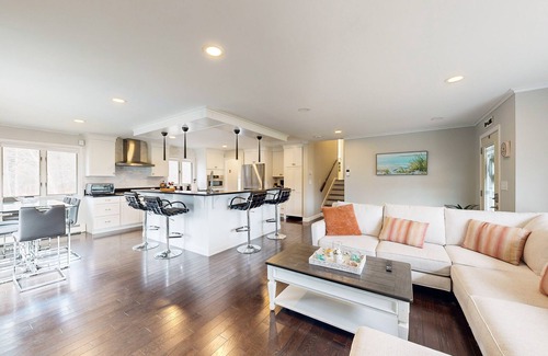 East Falmouth House | Waterfront home with firepit, grill, open layout, smart TVs, deck, W/D, & AC