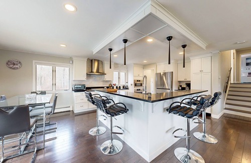 East Falmouth House | Waterfront home with firepit, grill, open layout, smart TVs, deck, W/D, & AC