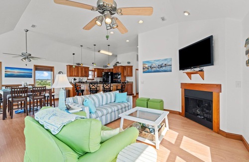 Frisco House | Waterfront home with boat dock, shared pool, & balcony with ocean view