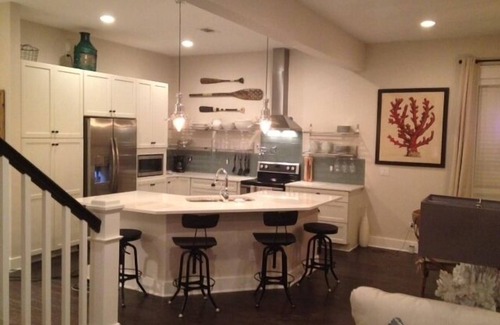 Navarre Beach House | Waterfront Home with Golf Cart, Kayaks, Bikes and Paddleboards!
