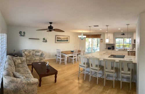 Edgewater House | Waterfront house, boat dock, pool, walking distance to Port Charlotte Beach