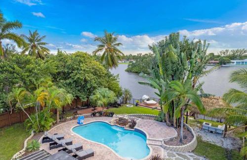 Ojus House | Waterfront Jungle House Firepit Sunset and more!
