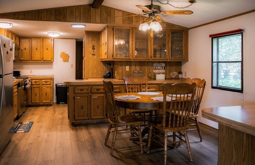 Oxford House | Waterfront lake house with dock, gazebo, kayaks, firepit, & central AC