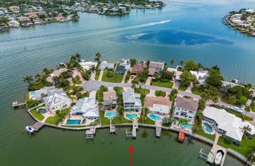 Indian Rocks Beach House | Waterfront Luxury w/Heated Salt Pool & Golf Cart