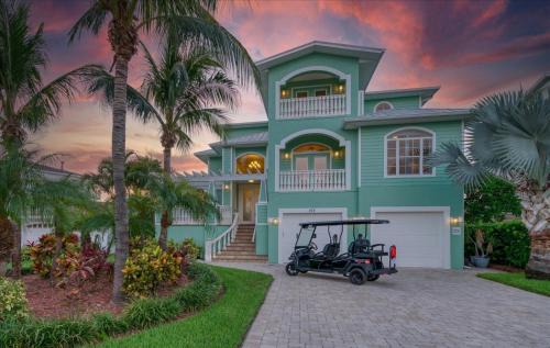 Indian Rocks Beach House | Waterfront Luxury w/Heated Salt Pool & Golf Cart
