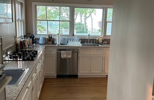 Southold House | Waterfront property with own dock and stunning views, overlooking Southold Bay.
