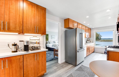 Lakebay House | Waterfront retreat with private beach, firepit, kayaks/SUP, EV charger & grill