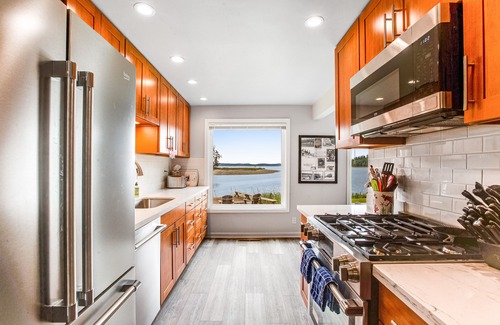 Lakebay House | Waterfront retreat with private beach, firepit, kayaks/SUP, EV charger & grill