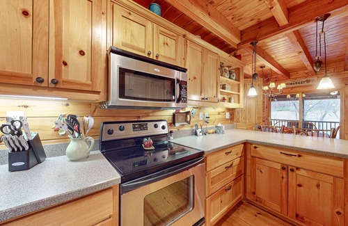 Ellijay Cabin | Waterfront retreat with a deck, grill, fireplace, board games, W/D, & central AC