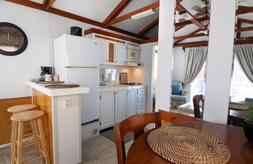 Tavernier Boat Rental | Waterfront Sunset View in the Aqua Villa Sand Dollar @ Mangrove Resort LLC