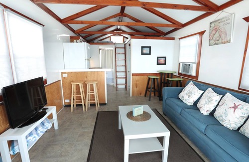 Tavernier Boat Rental | Waterfront Sunset View Aqua Villa at Conch Shell @ Mangrove Resort LLC