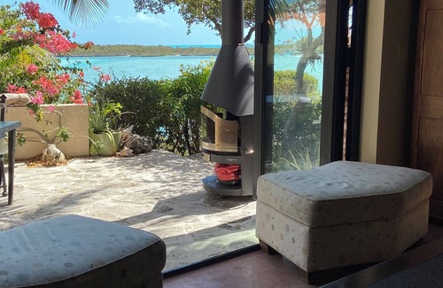 Ocean Point Villa | Waterfront villa offers white sandy beach and easy seaside access.