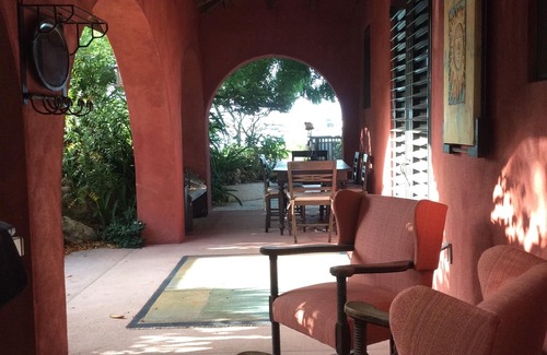 Ocean Point Villa | Waterfront villa offers white sandy beach and easy seaside access.