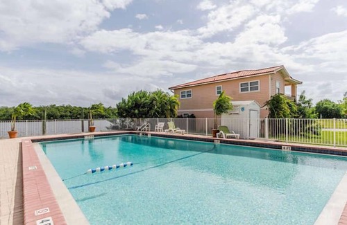 Everglades City Villa | Waterfront Villa With Large Deck And Screened Front Porch Overlooking The Pool