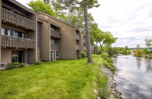 Glen Arbor Condo | Waterfront Walk Out at the Homestead Resort- Available Year Round