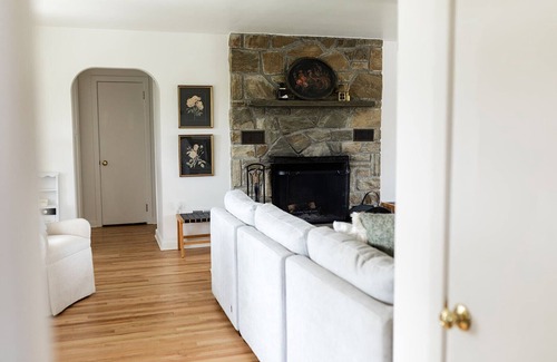 Fertility Cottage | Waterfront with Wood Fireplace + Outdoor Firepit + Paddleboat +1 mile to outlets