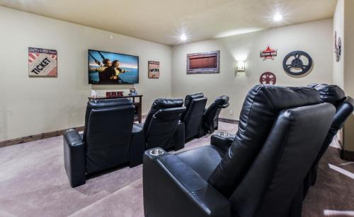 Indian Point House | WaterMill Cove Resort Luxury Lakefront Villa By Silver Dollar City Theatre Room POOL Lazy River