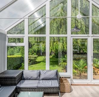 Neatishead House | Waterside Cottage - Hot Tub, Mooring, Arcade, Bar