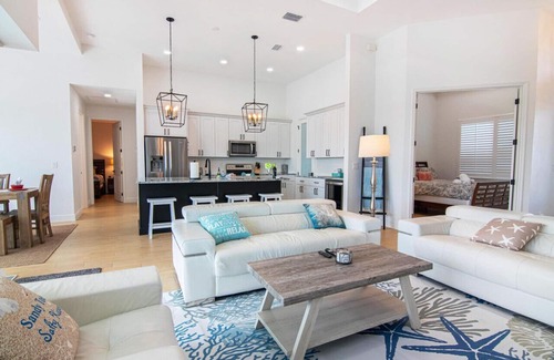 Pelican House | Waterside, Heated Saltwater Pool and Spa with Modern, Florida charm.