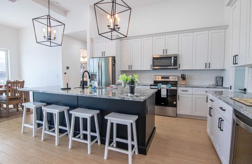 Pelican House | Waterside, Heated Saltwater Pool and Spa with Modern, Florida charm.