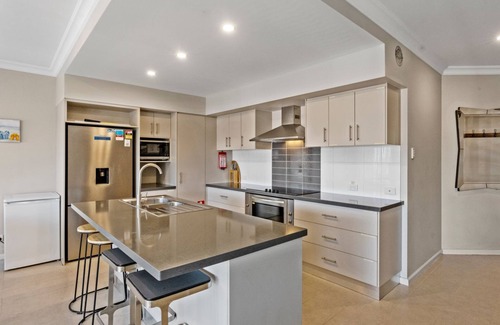 Exmouth House | Wave - Modern Villa on the Exmouth Marina with boat mooring.