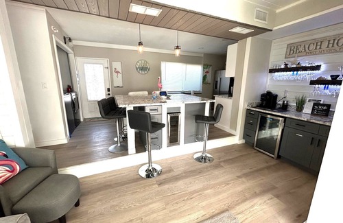 South Island House | WE ARE BACK! NEWER POOL/SPA and Walk to beach! Totally updated Canal front home!