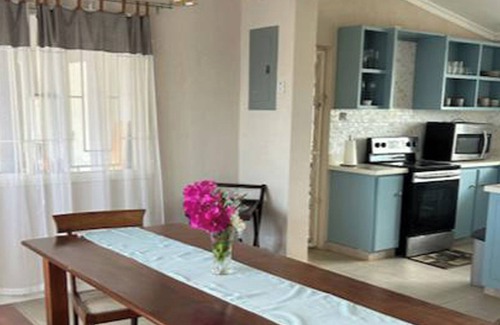 Callendar House | Welcome to Hope Winds, a charming property ranch-style house on a seren