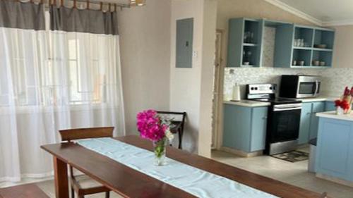 Callendar House | Welcome to Hope Winds, a charming property ranch-style house on a seren