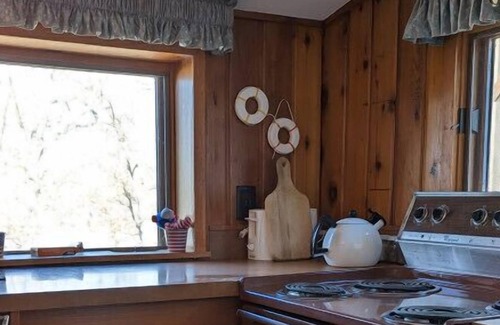 Amery House | Welcome to our charming lakefront cottage on Bear Trap Lake in Amery, Wisconsin!