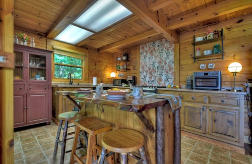 Walnut Mountain Cabin | Welcome to Starlight Mountain: Pet-friendly haven boasting stunning mountain views, hot tub, fire-table, pool table, and reliable WiFi