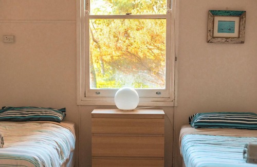 Island Beach House | Welcome to The Cheeky Wren, Your Ultimate Sanctuary Amidst Nature's Embrace