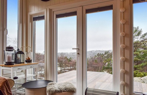 Spangereid House | Welcome to this quality holiday home with great mountain views.