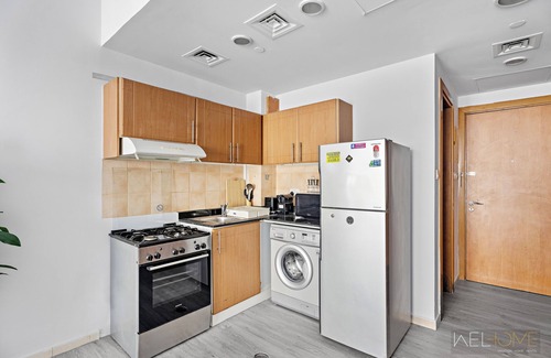 Dubai Production City Apartment | WelHome - Greenery Apt for Modern Studio in Production City