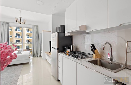 Dubai Production City Apartment | WelHome - Lovely Studio Apartment in Production City